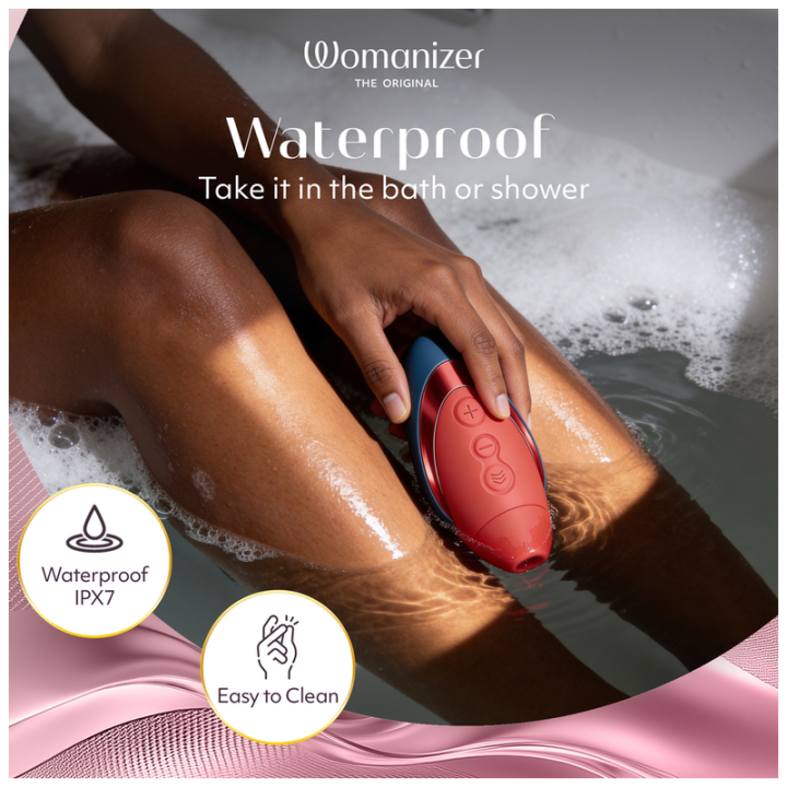 WOMANIZER - NEXT LIBERTY 3D PLEASURE AIR CLITORIAL STIMULATOR BLUE/RED
