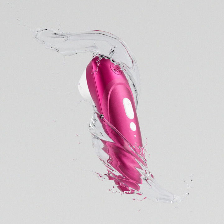 WOMANIZER - ESTIMULADOR CLITORIANO DE SUCÇÃO PROFISSIONAL COM 11 NÍVEIS DE INTENSIDADE. ROSA VIBRANTE